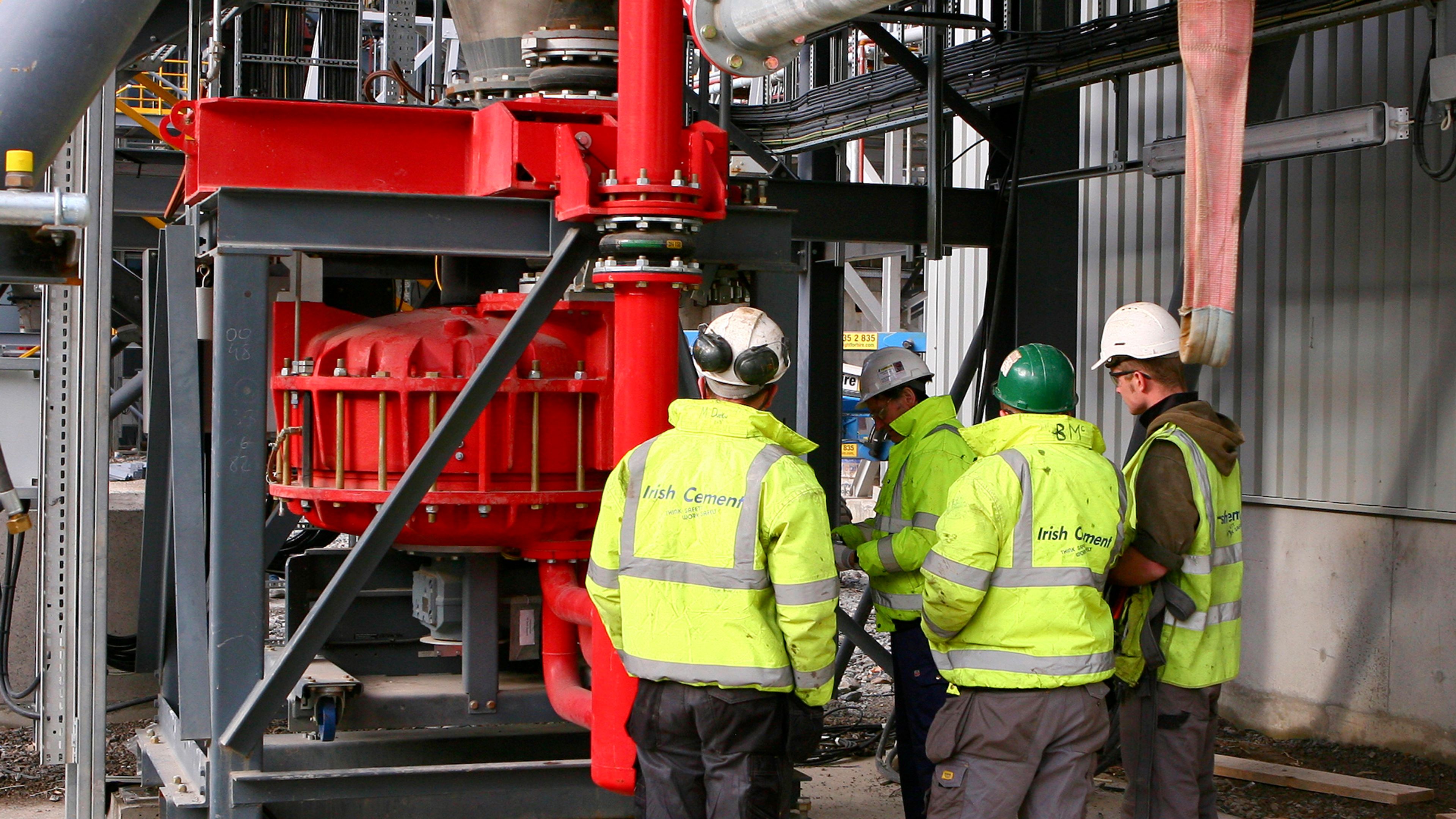 PFISTER® feeding and dosing services - 3 man shown maintaining the product.